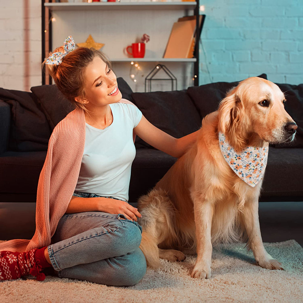 Estilo de primavera para perros con diseño floral naranja, amarillo y hojas azul marino