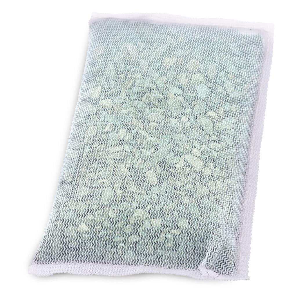 Embalaje del eliminador Fluval AC50, listo para usar en acuarios.