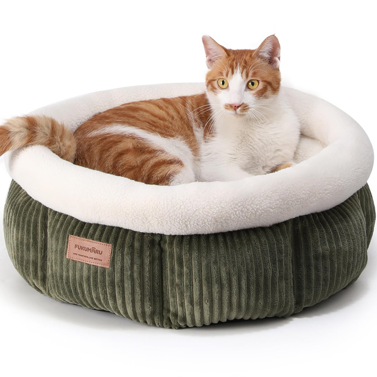 Cama FUKUMARU para gato, diseño redondo de pana, refugio cómodo.