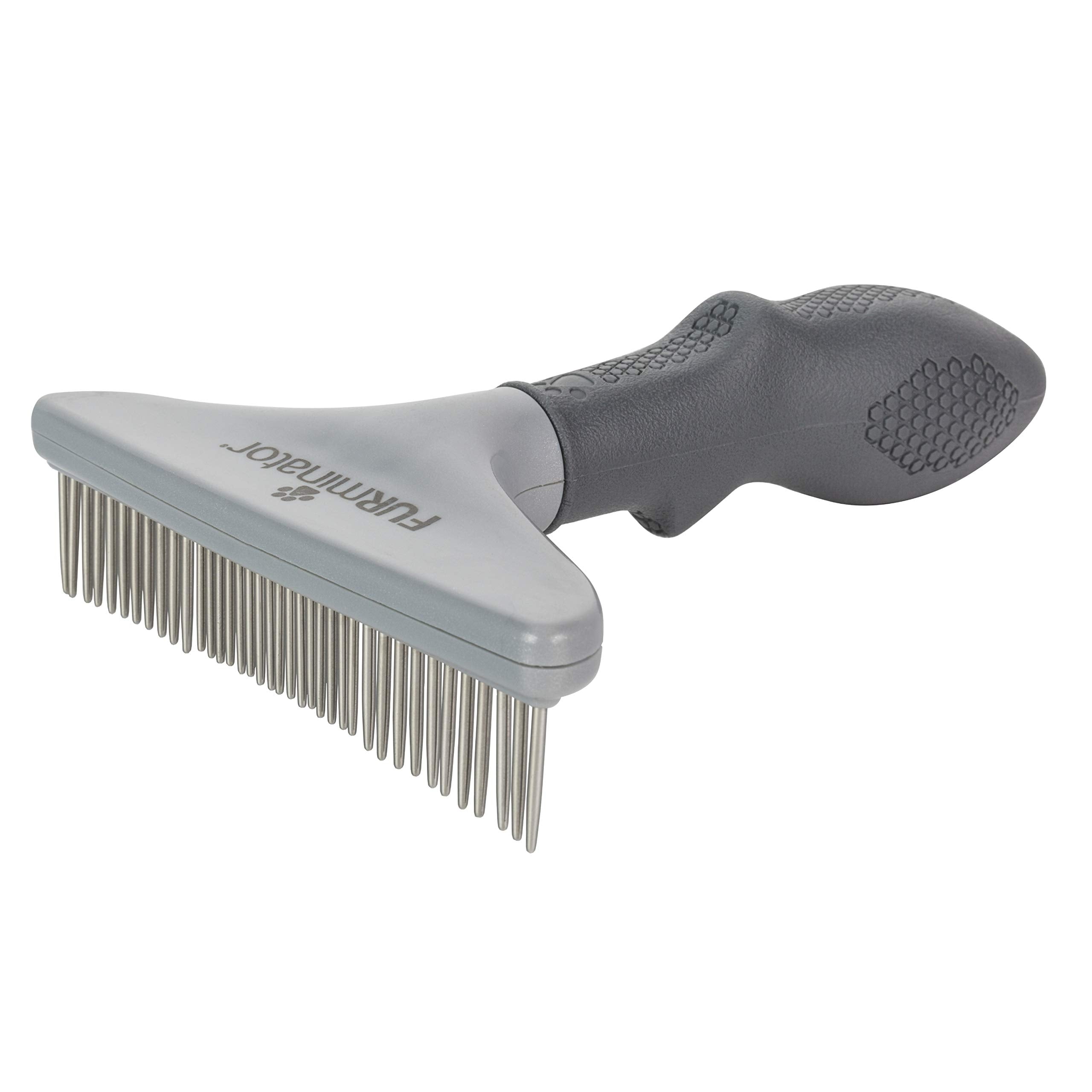 Dientes giratorios del FURminator reduciendo enredos en pelaje grueso