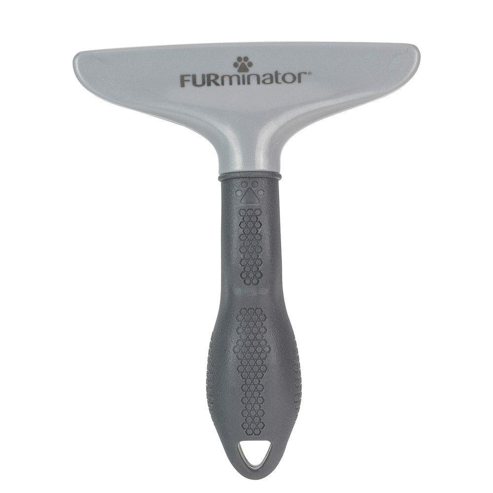 Mango ergonómico del FURminator ofrece control durante el cepillado