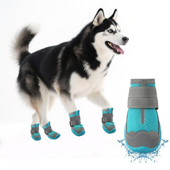 Botas Furrtripsy azul impermeables protegiendo patas en pavimentos calientes.