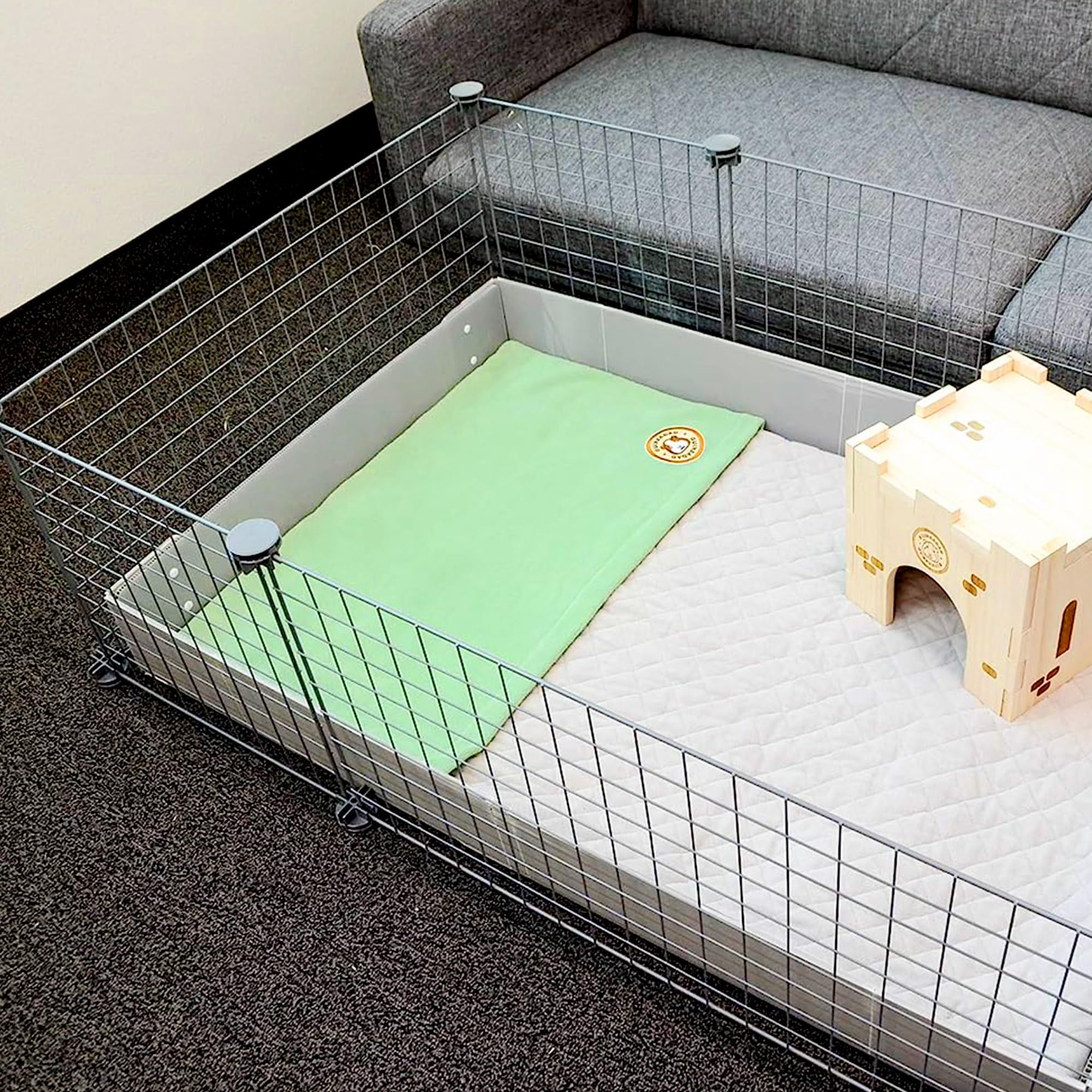 GuineaDad protección-suelo-impermeable evita manchas bajo la jaula