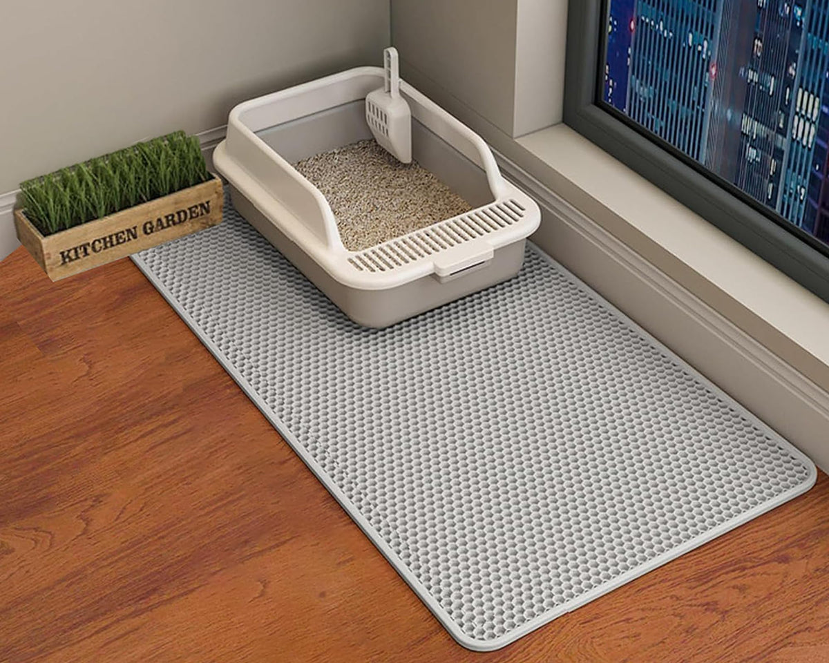 Alfombra HCY&WLD 45x26 gris atrapa arena y protege el suelo.