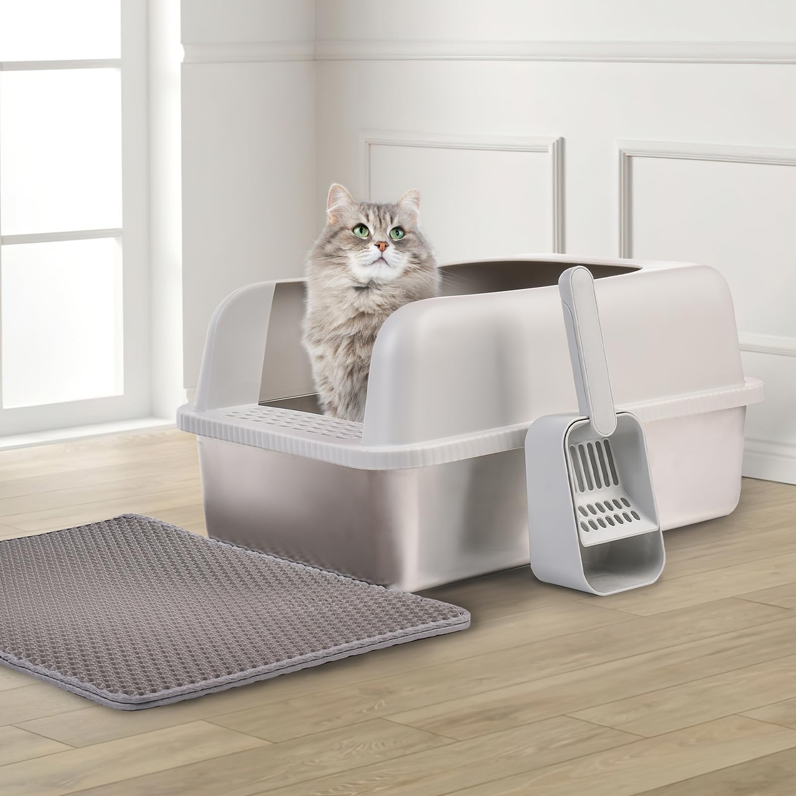 Pala para arena con soporte, accesible junto a la bandeja Henkelion.
