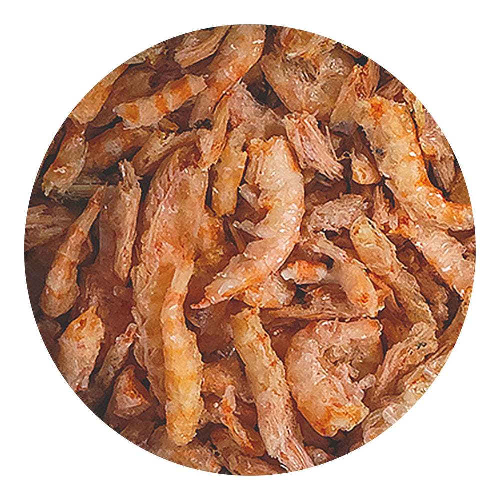 Hikari krill liofilizado en acuario, fácil de incorporar a la rutina de alimentación.