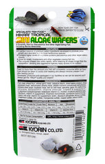 Hikari Mini Algae Wafers primer plano de obleas, alimento diario para acuarios.