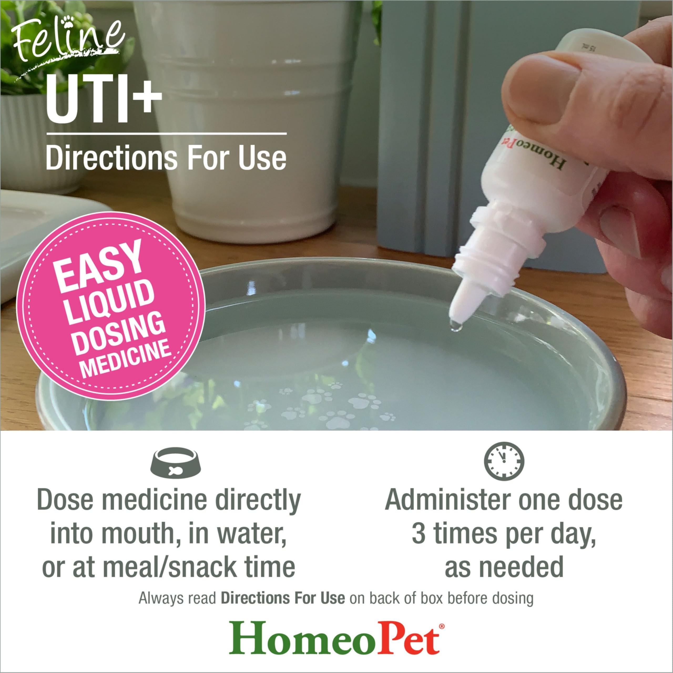 HomeoPet Felino UTI+ manos aplicando dosis para gato