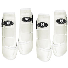 Botas Horntack para espinillas en caballo blanco grande, protección de tendones y ajuste frontal.