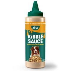 Botella de Jinx Kibble Sauce con caldo de pollo real para perros.