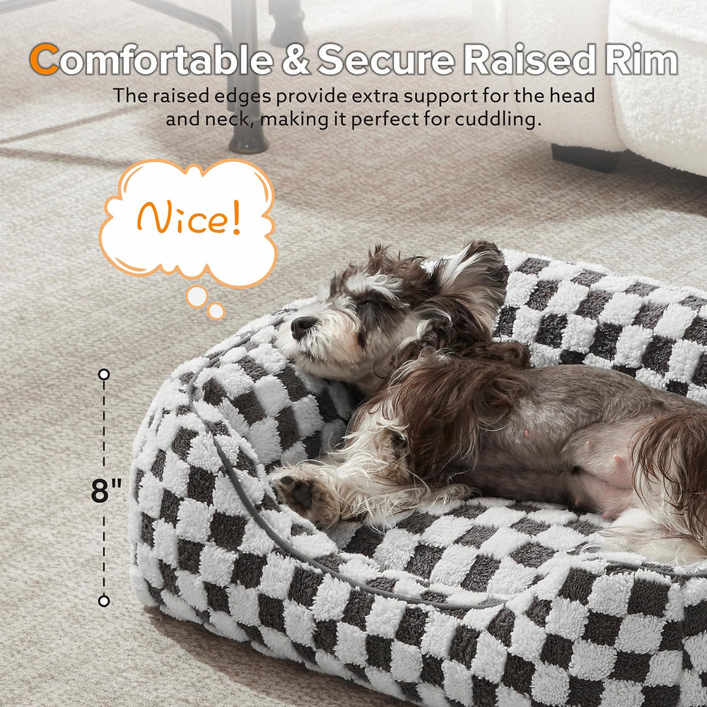 Cama JOEJOY para perros con bordes alzados que brindan soporte.