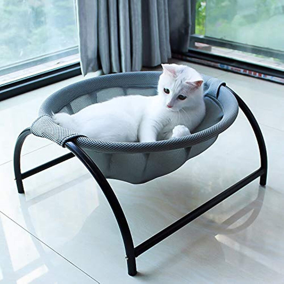 La cama-hamaca JUNSPOW para gatos, uso interior y exterior, comodidad estable.