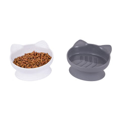 Kitty City: tazones alimentación lenta elevados (blanco y gris), fomentan ingesta más calmada.