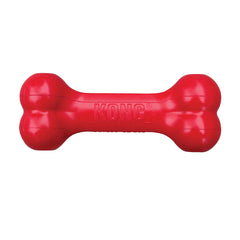 KONG Goodie Bone en mano, perfecto para estimular la interacción con perros pequeños