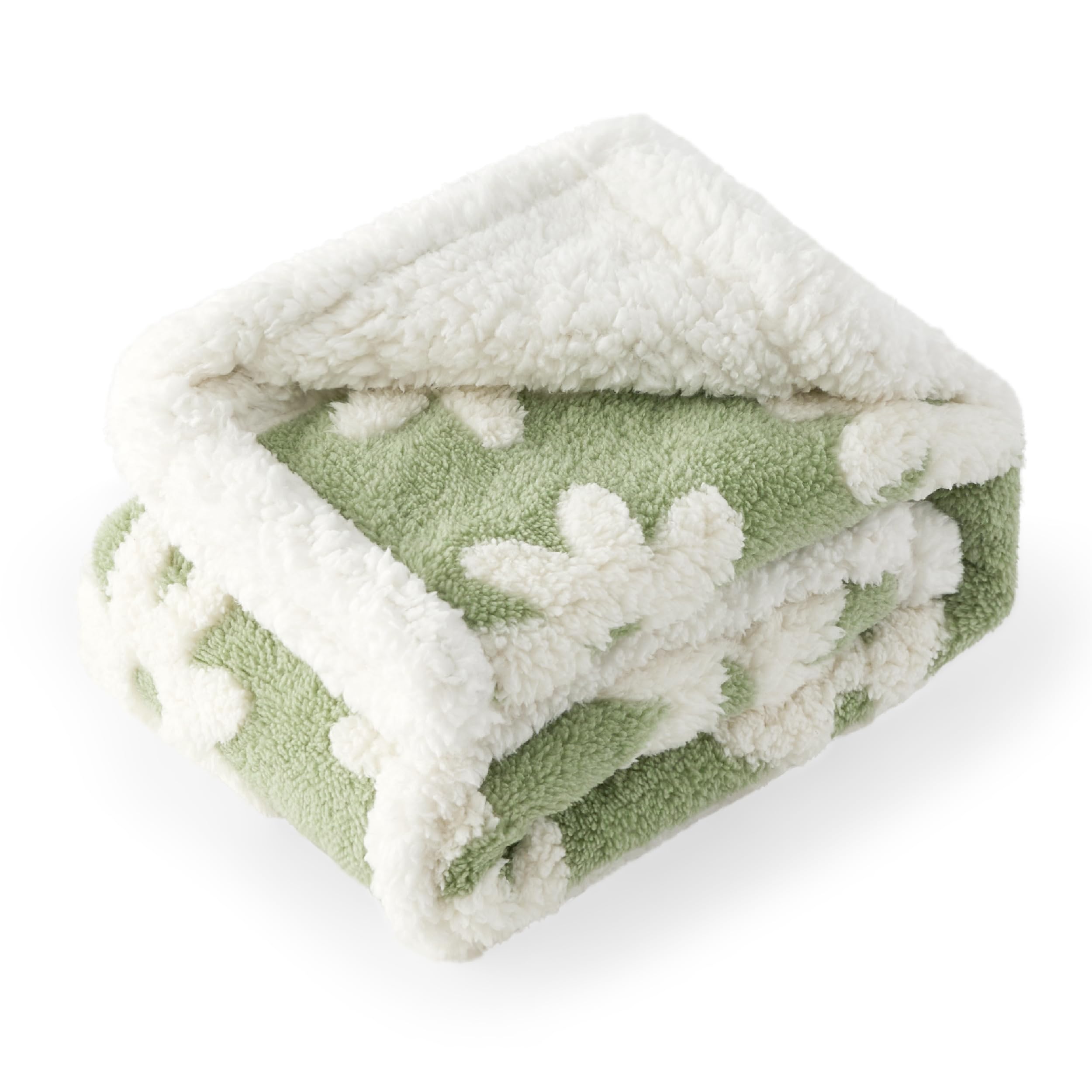 Manta LE SURE jacquard denso: textura mullida para mayor confort.