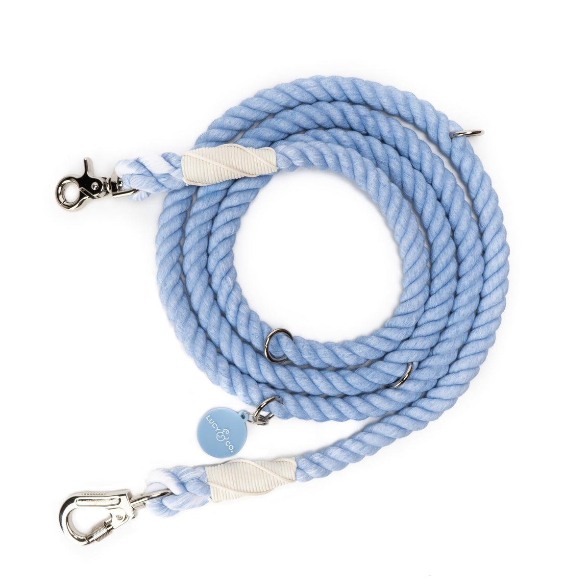 Lucy & Co. correa denim azul de manos libres para paseos cómodos.