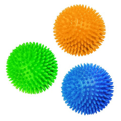 Pelotas Meric CoCoo con espigas azules para perro, masajean encías y promueven juego.