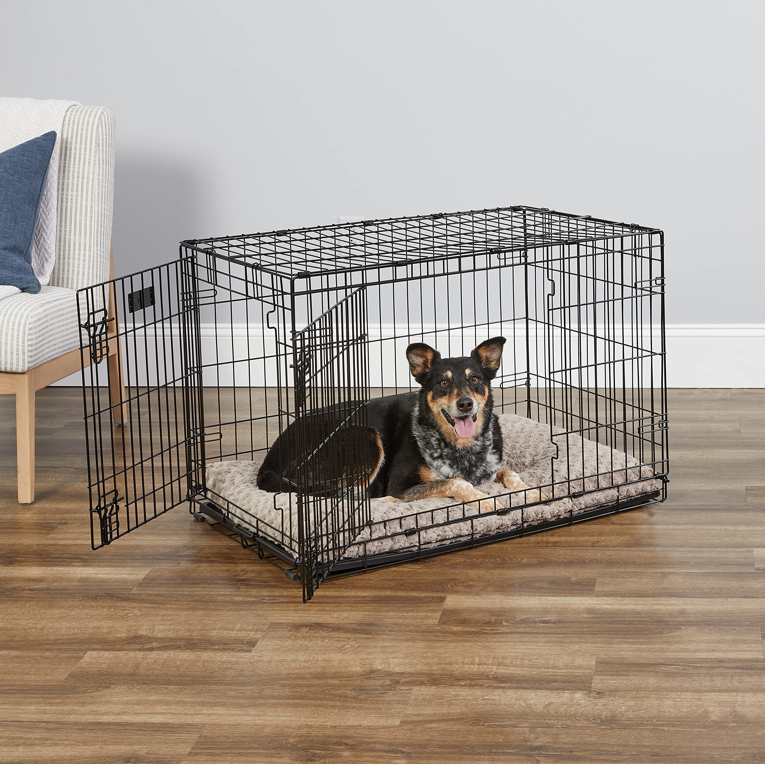 MidWest iCrate con panel divisor para crecimiento progresivo del perro.