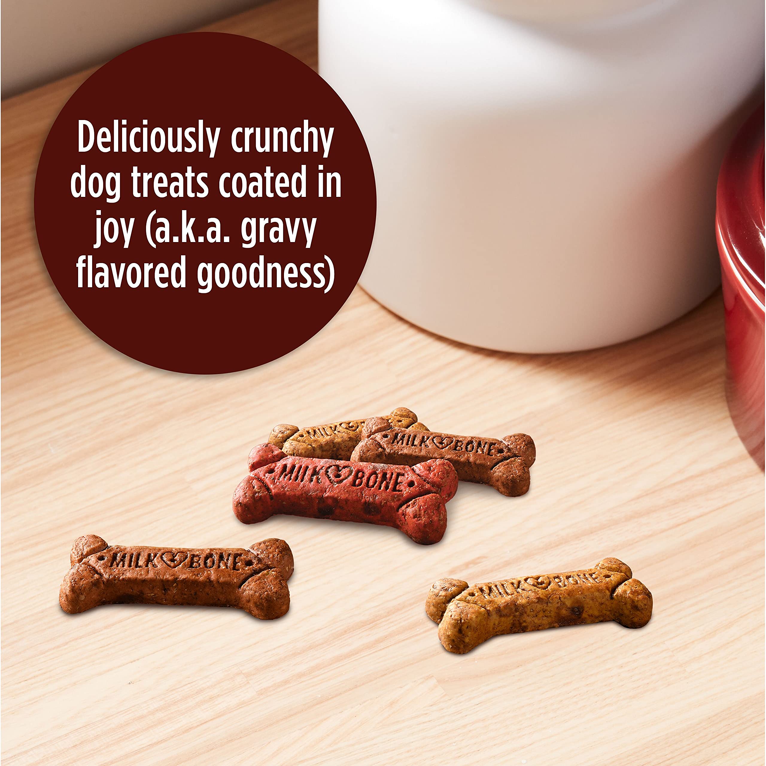 Milk-Bone Gravy Bones sabor tocino bañado en salsa, experiencia sabrosa.