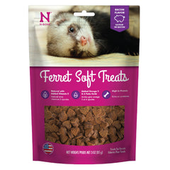 N-Bone golosinas suaves para hurón sabor tocino en mano para recompensa diaria.
