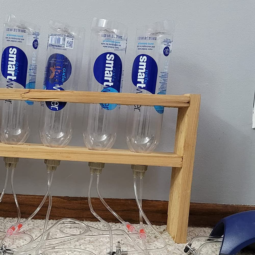 Tapa OAIDVEUY artemia con conector de pezón para flujo controlado.