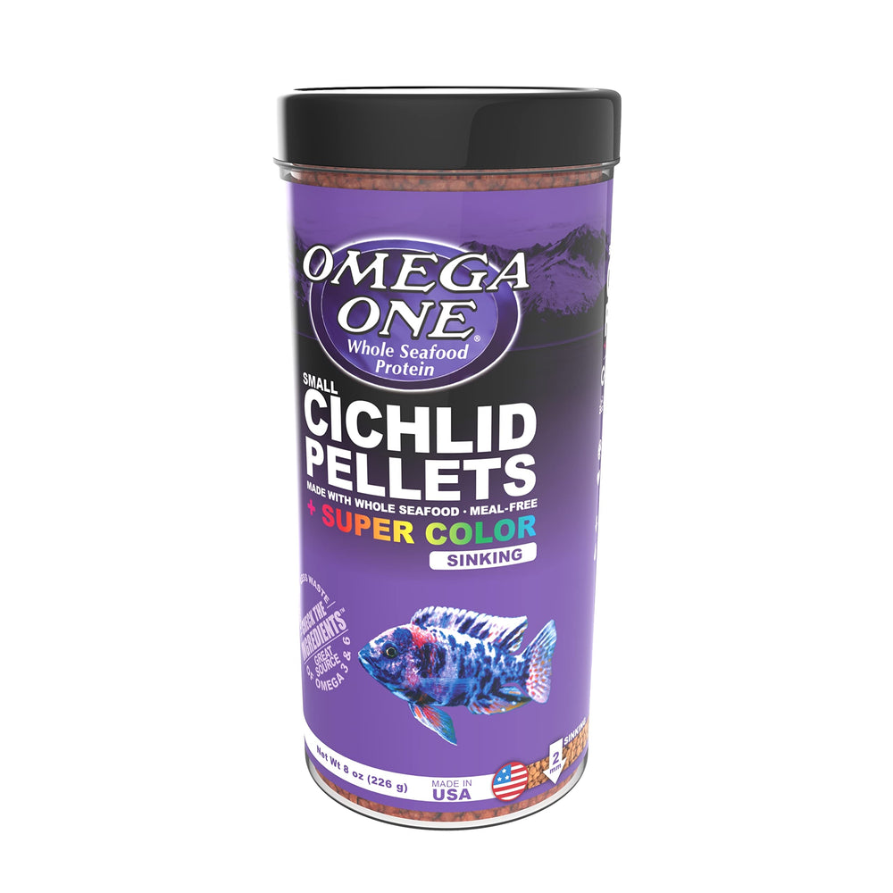 Omega One cíclidos en acuario, comiendo gránulos nutritivos