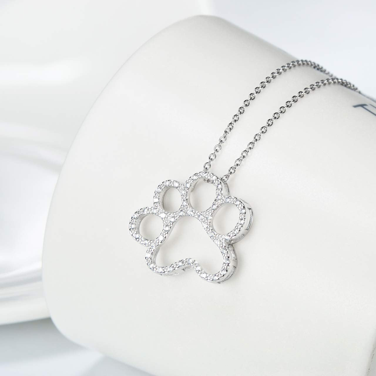 ONEFINITY empaque regalo collar huella, listo para sorprender a un ser querido.