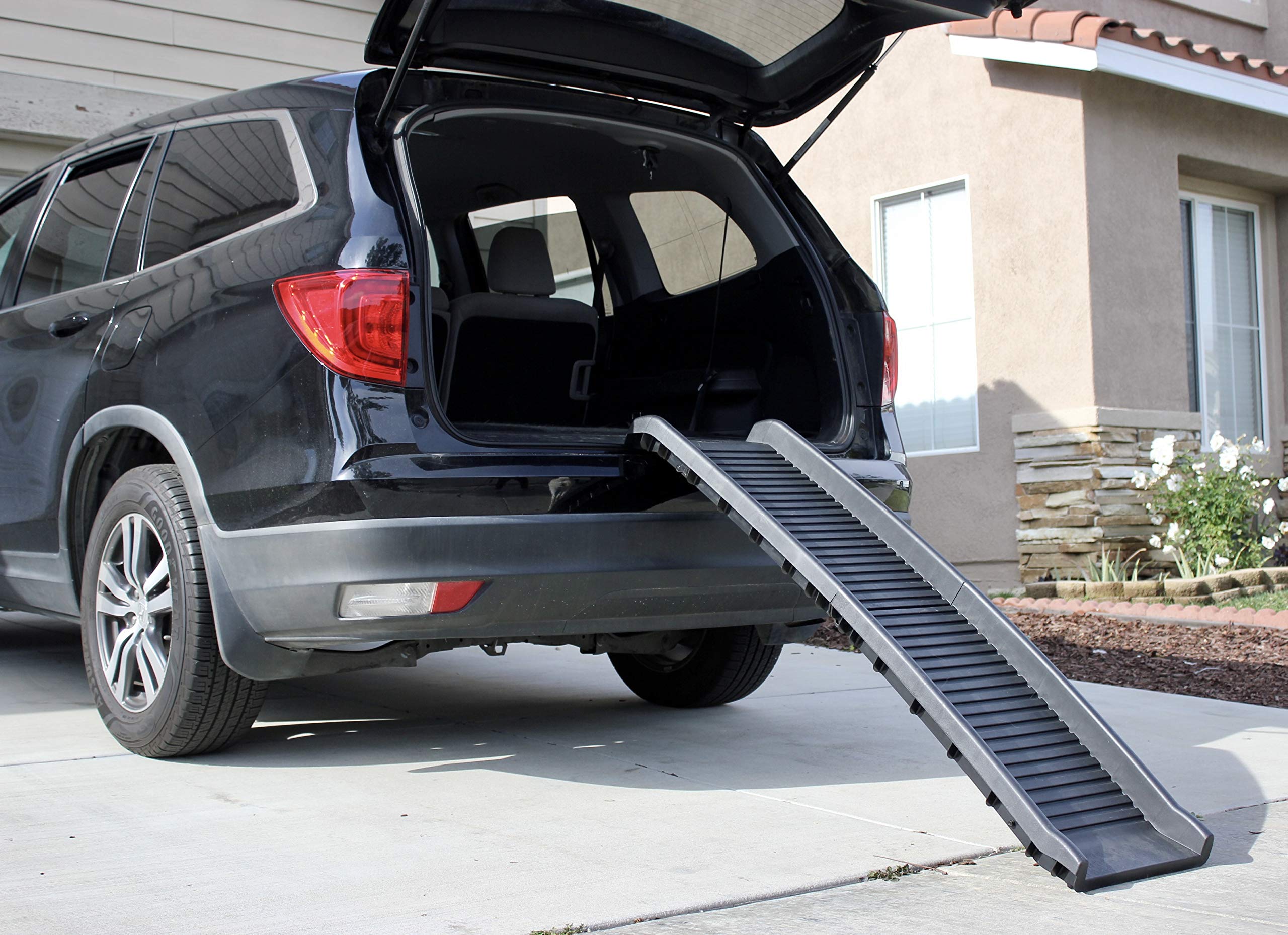 PawStep uso multi-superficie para coche, cama y sofá
