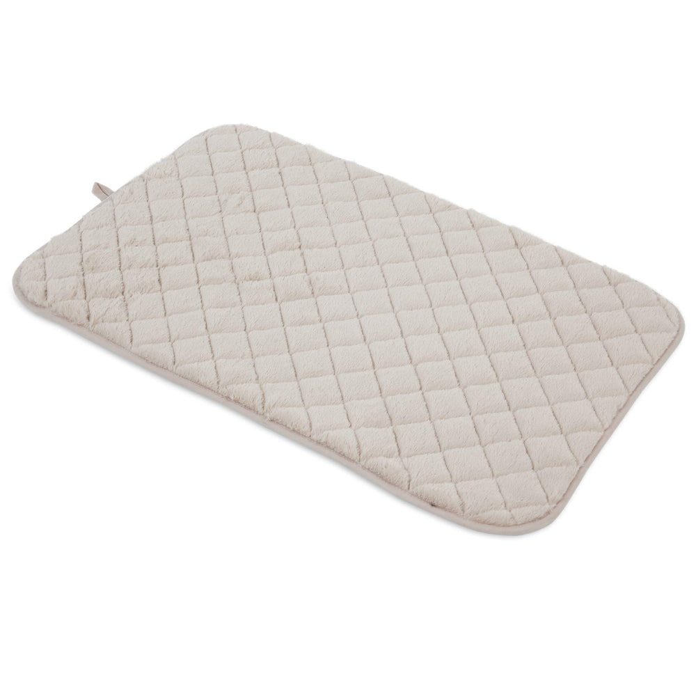 Petmate SnooZZy Cream, esterilla acolchada para kennel, ofrece confort durante viajes y descansos en casa.