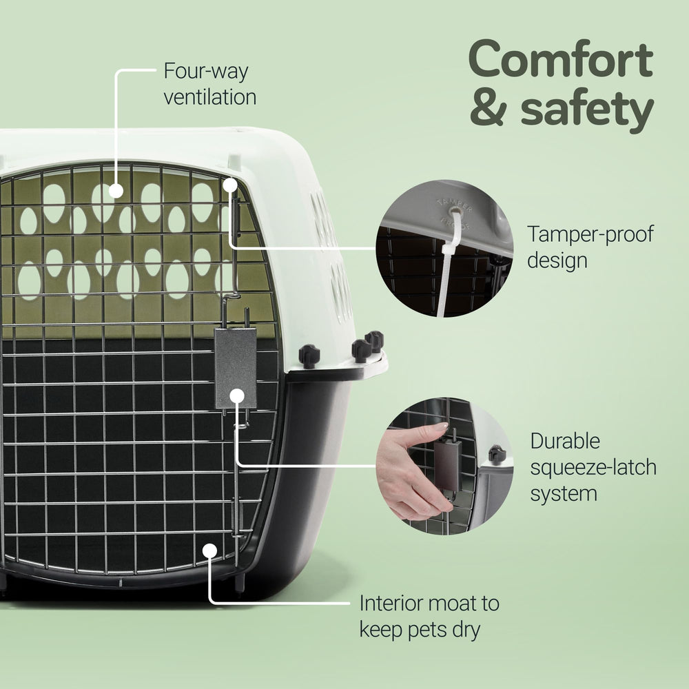 Asa plegable facilita llevar el transportin Petmate con una mano.