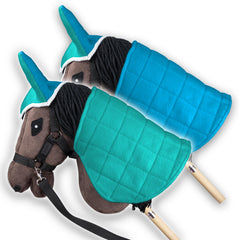 Manta reversible SKIPPI de dos caras menta y azul para cambiar la apariencia.