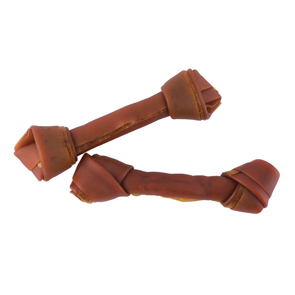Perro disfruta SmartBones, masticable sabroso para sesiones de juego.