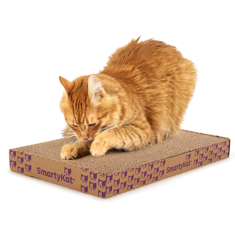 SmartyKat Super Scratcher uso plano reversible para mayor comodidad.