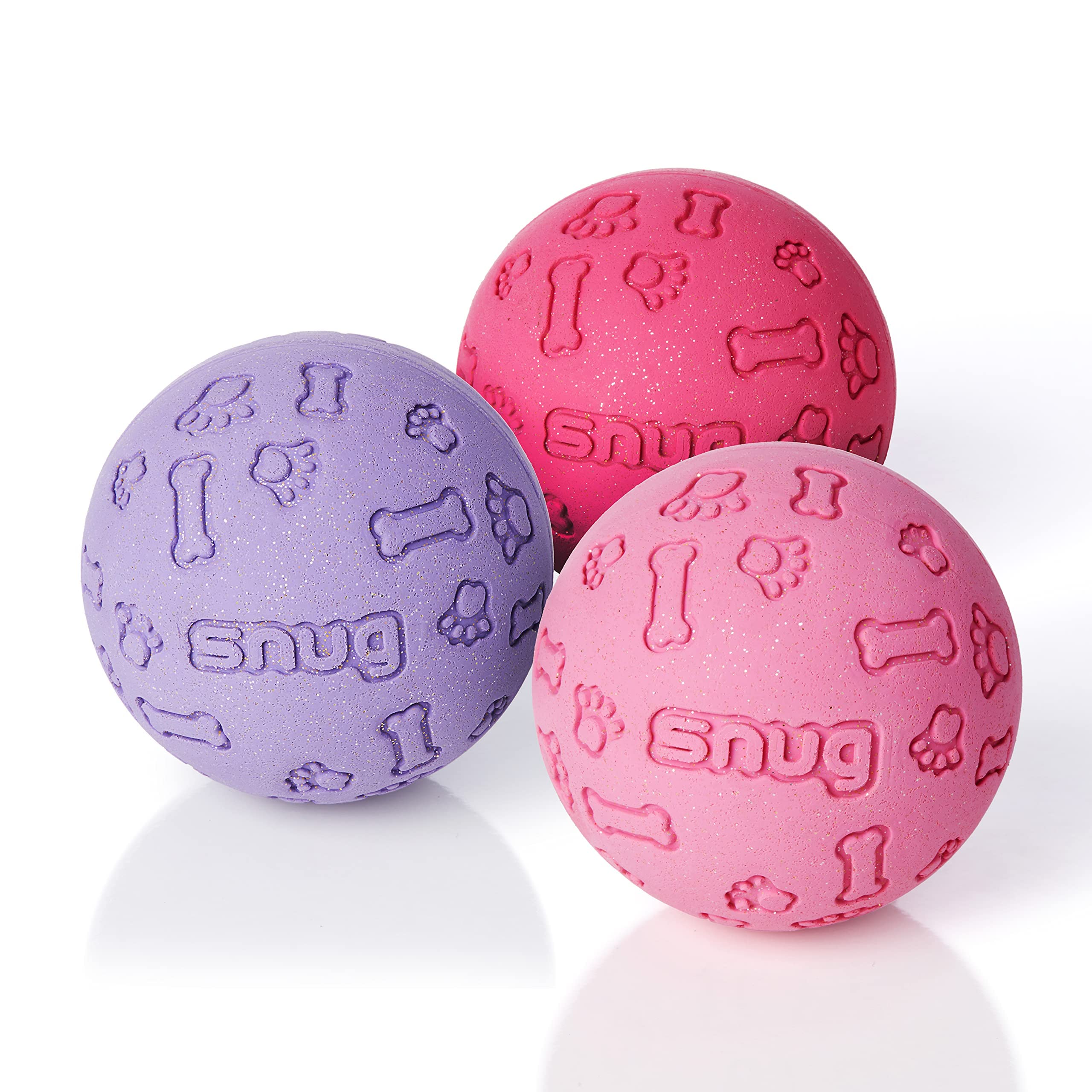 Bola Snug de caucho para perros pequeños, ideal para juego al aire libre.