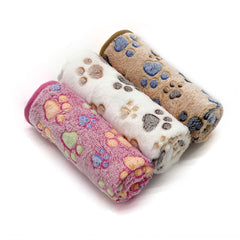 Manta SORKUT para perros con huellas beige, protección y comodidad.