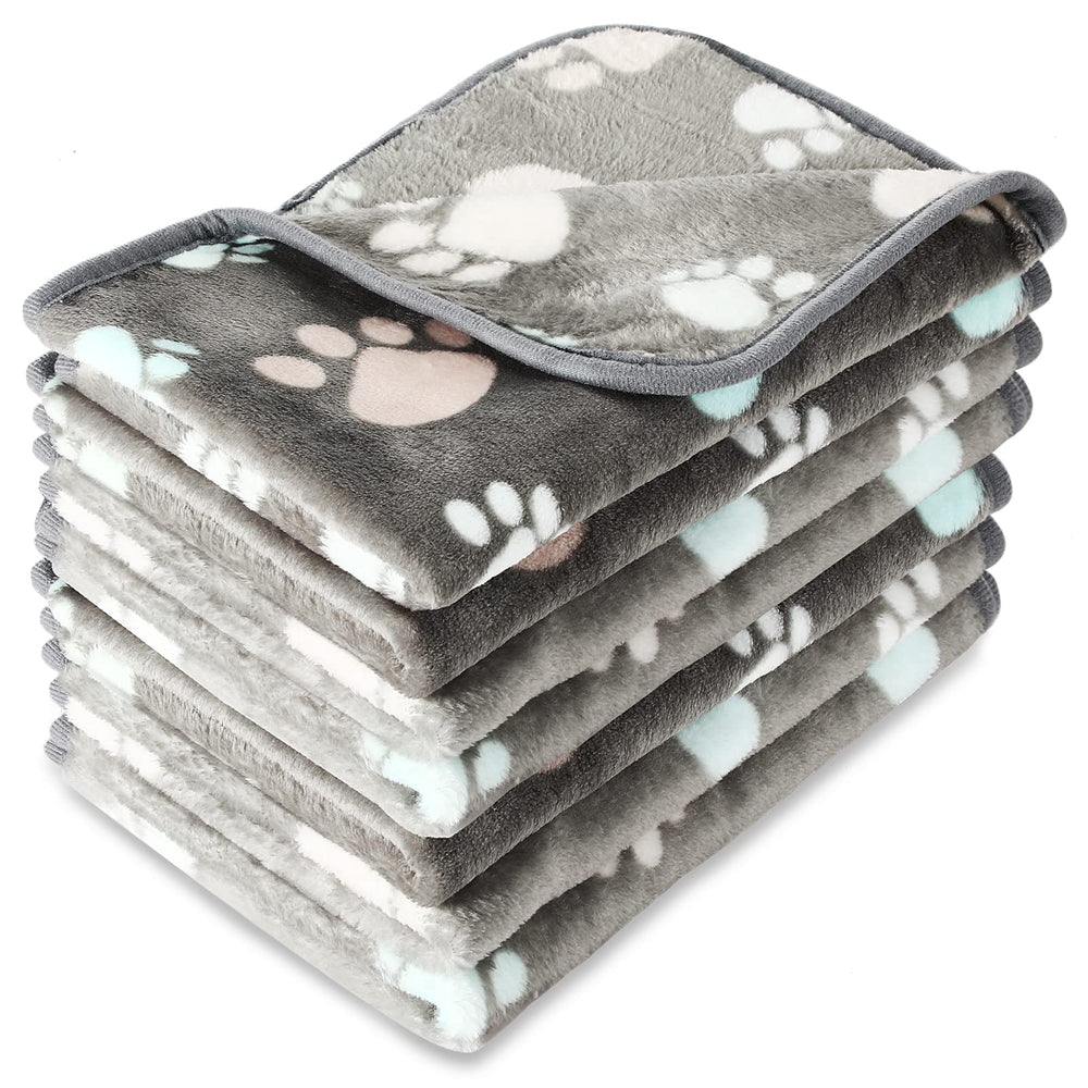Couverture Tatuo pour chien avec empreintes-pattes, repos idéal.