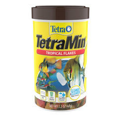 TetraMin copos tropicales equilibrados para acuario, promueven crecimiento y salud.