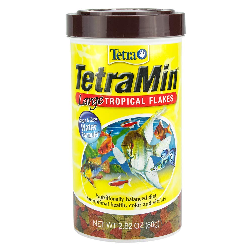 Tetramin XL Tropical Flakes en taza, facilita ver la cantidad consumida