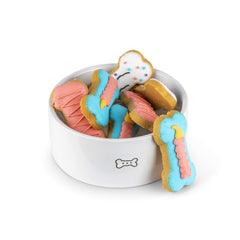 Thoughtfully Pets galletas crujientes en forma de hueso rosa.
