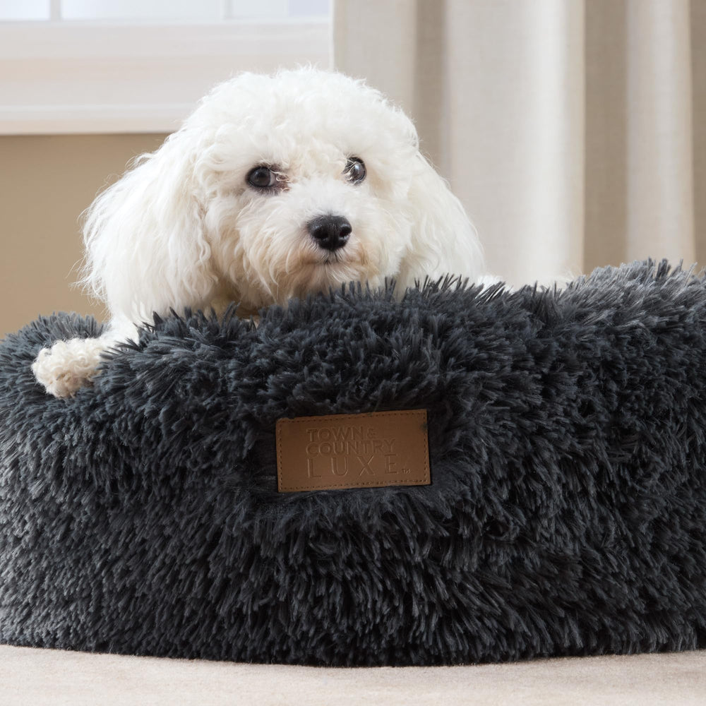 Forma redonda envolvente Town & Country Luxe CuddleTown para descanso seguro.
