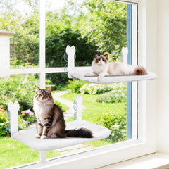 Hamaca de ventana Turbosus para gatos en dos pack instaladas en ventanas con luz natural.