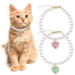 Tyqour collar de perlas con corazón rosa para gatitos, añade elegancia en eventos.