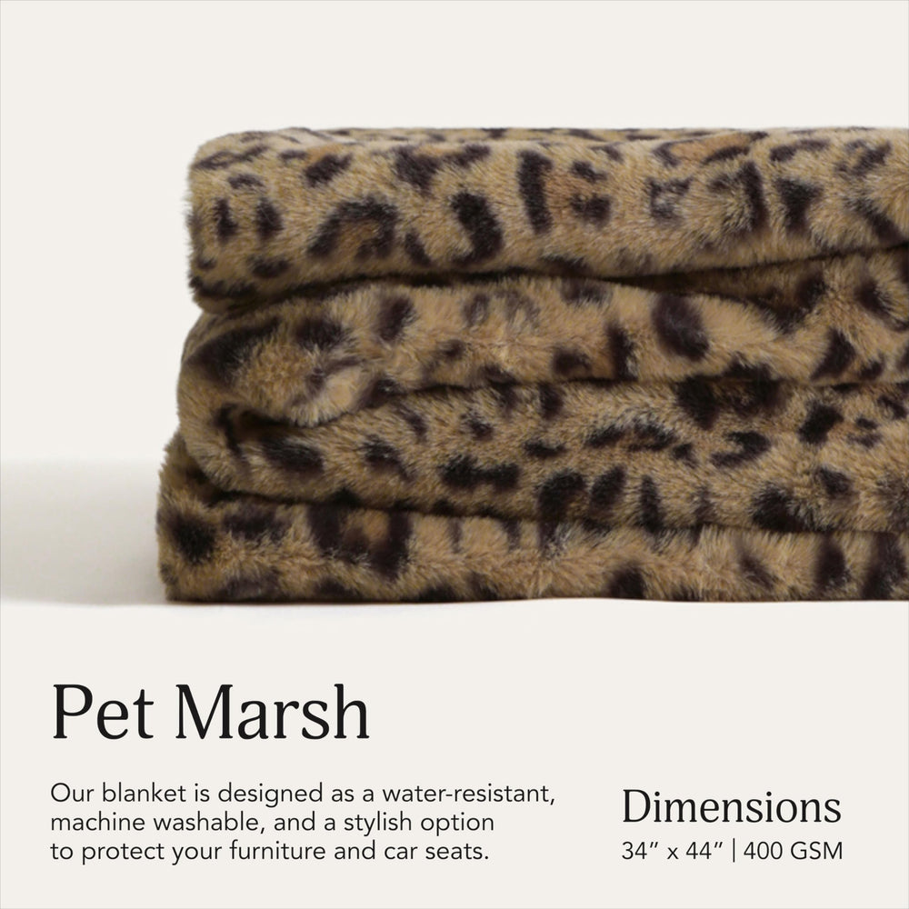 UnHide Lil’ Pet Marsh, manta pelo falso leopardo, protege muebles de pelos y suciedad.