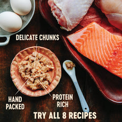 Wellnes CORE Signature Selects lata con trozos de pollo y salmón en salsa sabrosa.