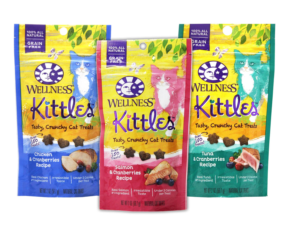 Wellness Kittles variedad de sabores para gatos adultos, snack crujiente y sabroso.