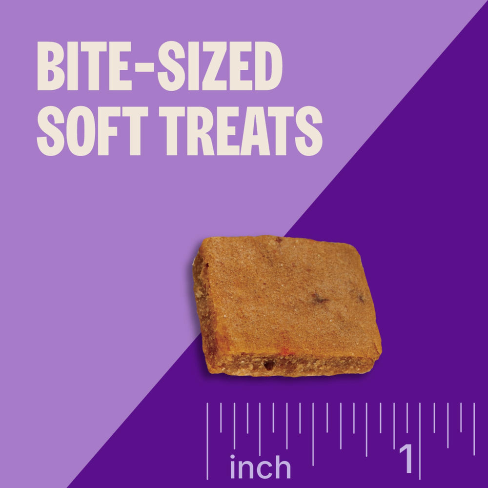 Wellness Puppy Treats, empaque sin granos, opción para perros sensibles.