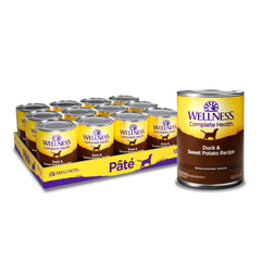 Wellness: lata para perros con pato y batata, proteína real y nutrientes.
