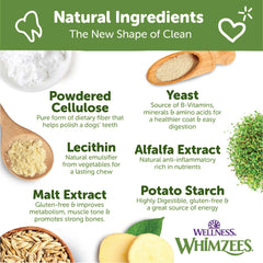 Whimzees Wellness Alligator, masticables en mano, diseño para masticar y limpiar.
