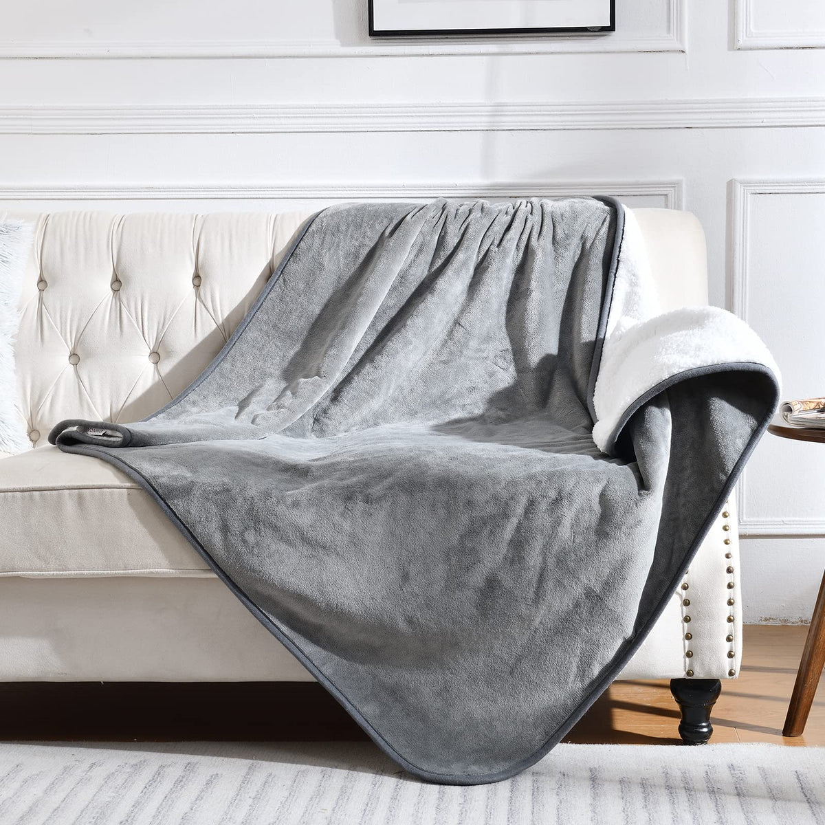 Manta Yaning impermeable para cama y sofá protege derrames y pelos.