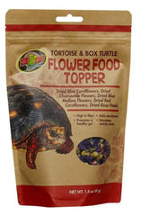 Zoo Med complemento floral para tortugas, aparece en plato para dieta variada.